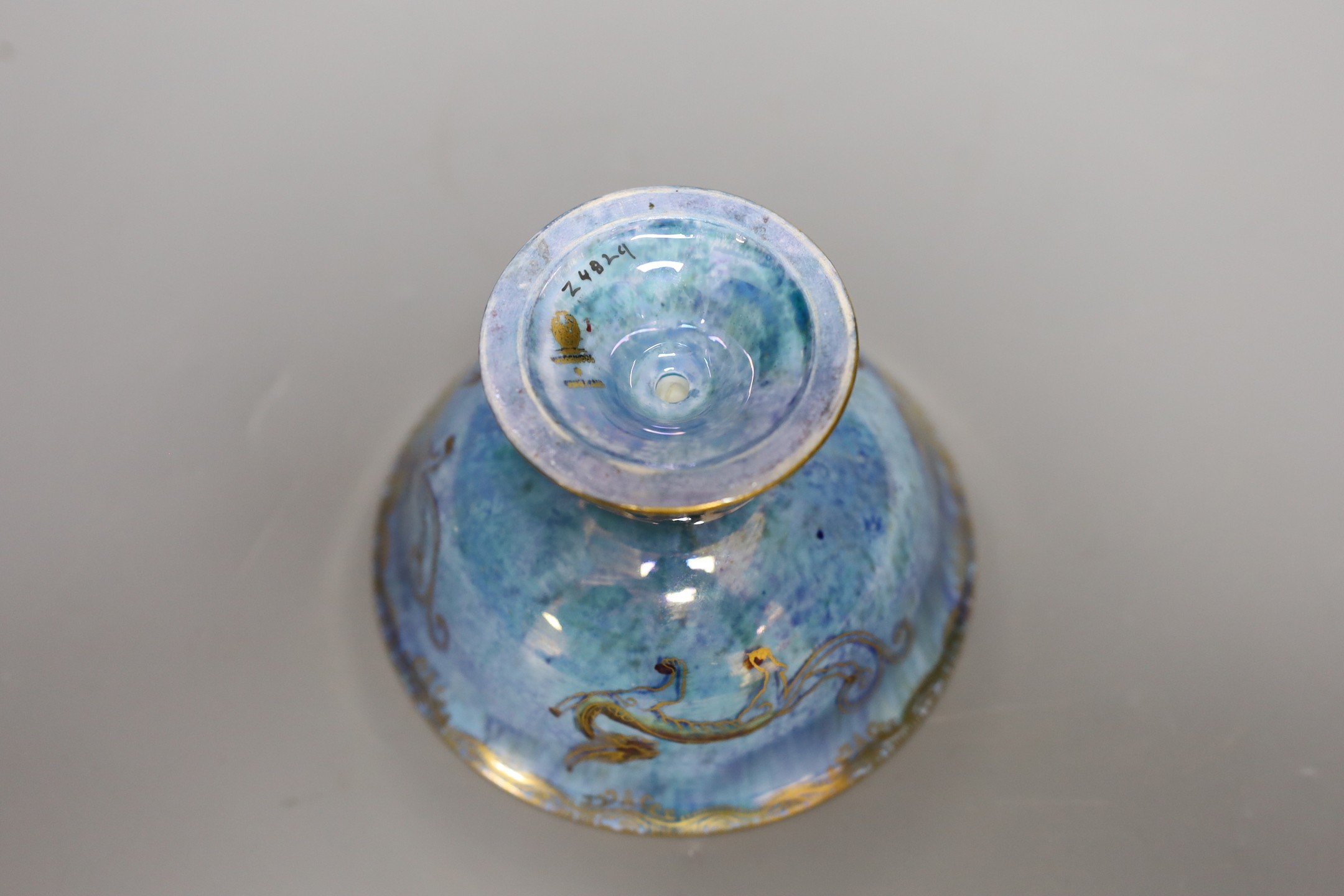 A Wedgwood blue lustre chinoiserie pedestal bowl, designed by Daisy Makeig Jones, pattern number Z4829, 8 cms high